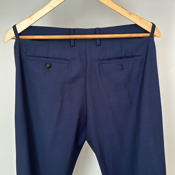 Navy dress pants with thin black stripe down outside of leg. - Picture 4 of 5